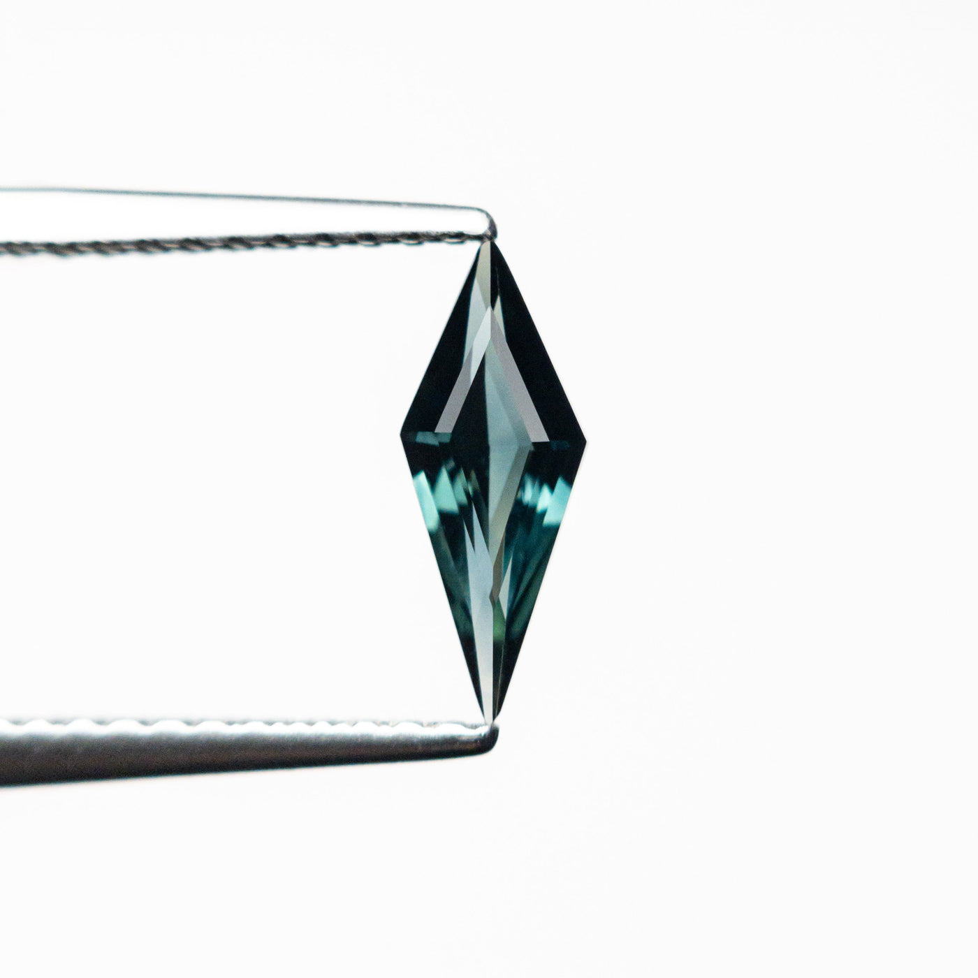 0.46ct 9.62x3.77x2.27mm Kite Step Cut Sapphire 25740-17