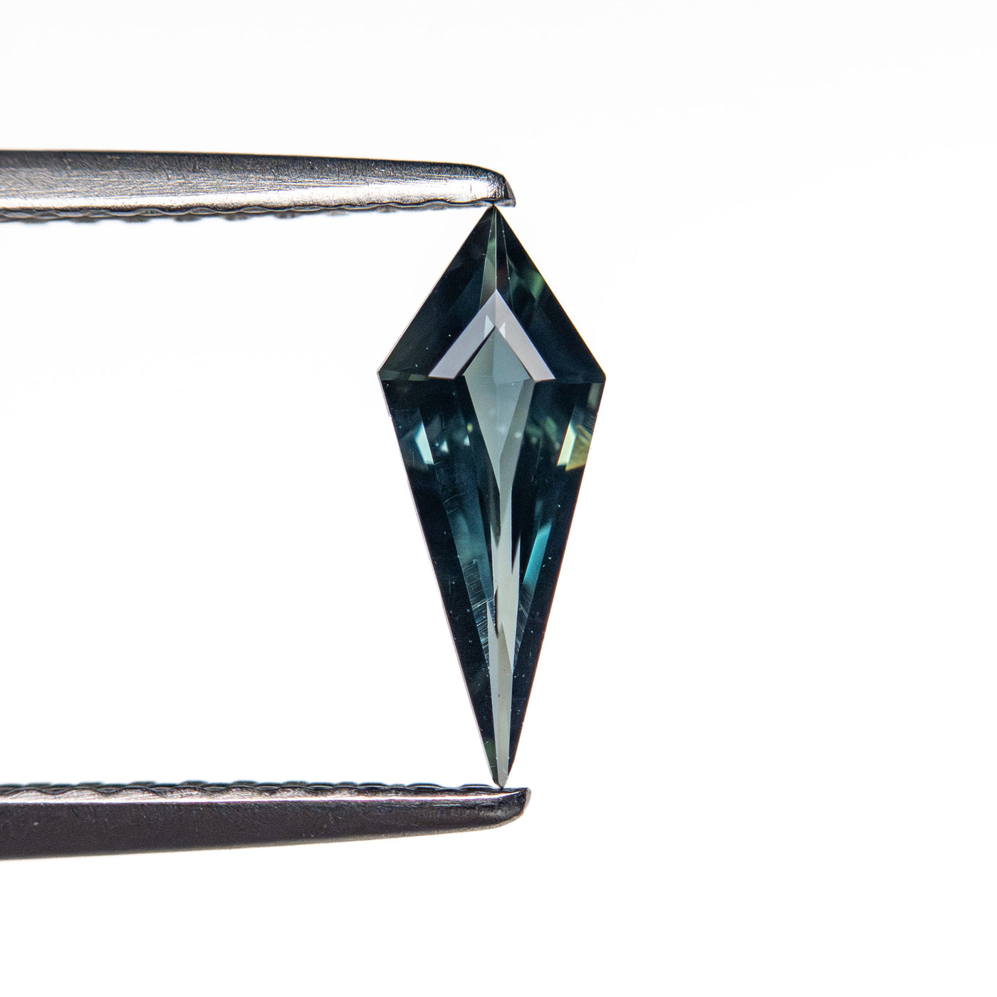 0.42ct 9.69x3.83x2.16mm Kite Step Cut Sapphire 25740-21