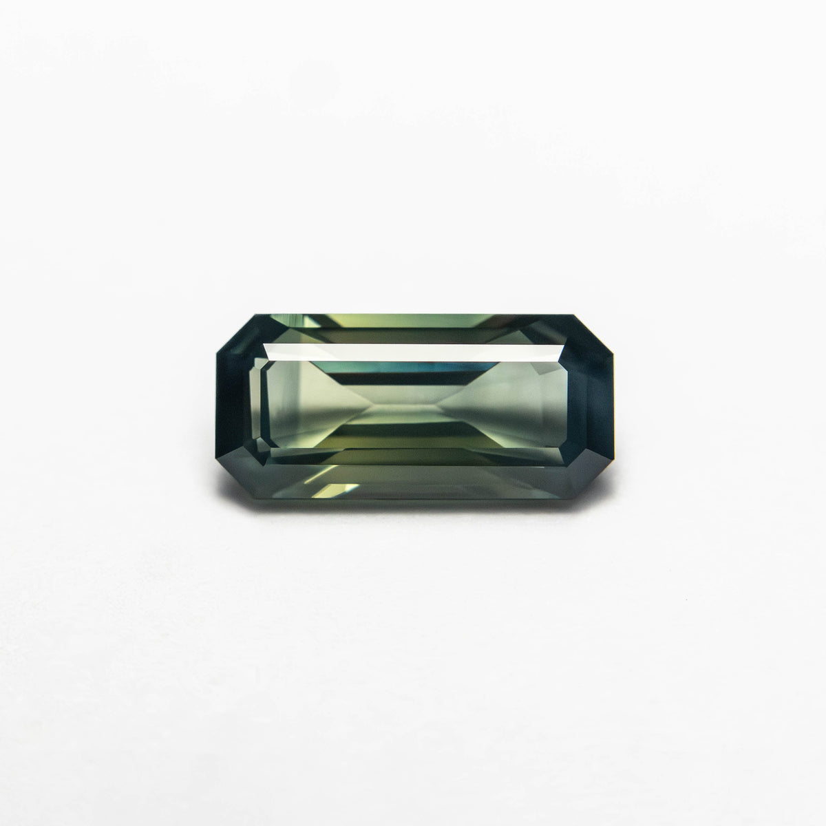 0.71ct 7.78x3.64x2.46mm Cut Corner Rectangle Step Cut Sapphire 27336-53