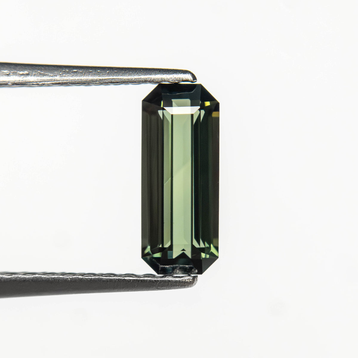 0.77ct 8.35x3.41x2.50mm Cut Corner Rectangle Step Cut Sapphire 27336-58
