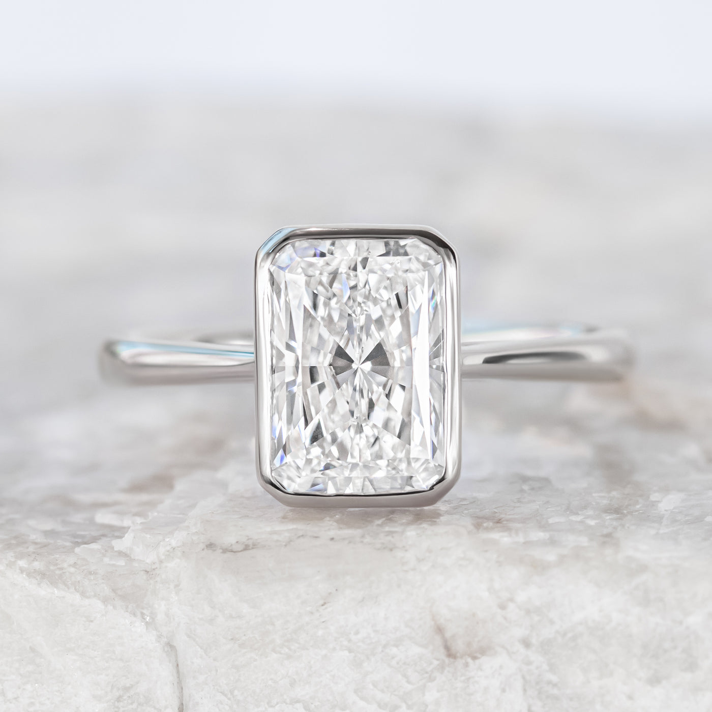 Betsy ~ Emerald & Radiant Cut Bezel Ring