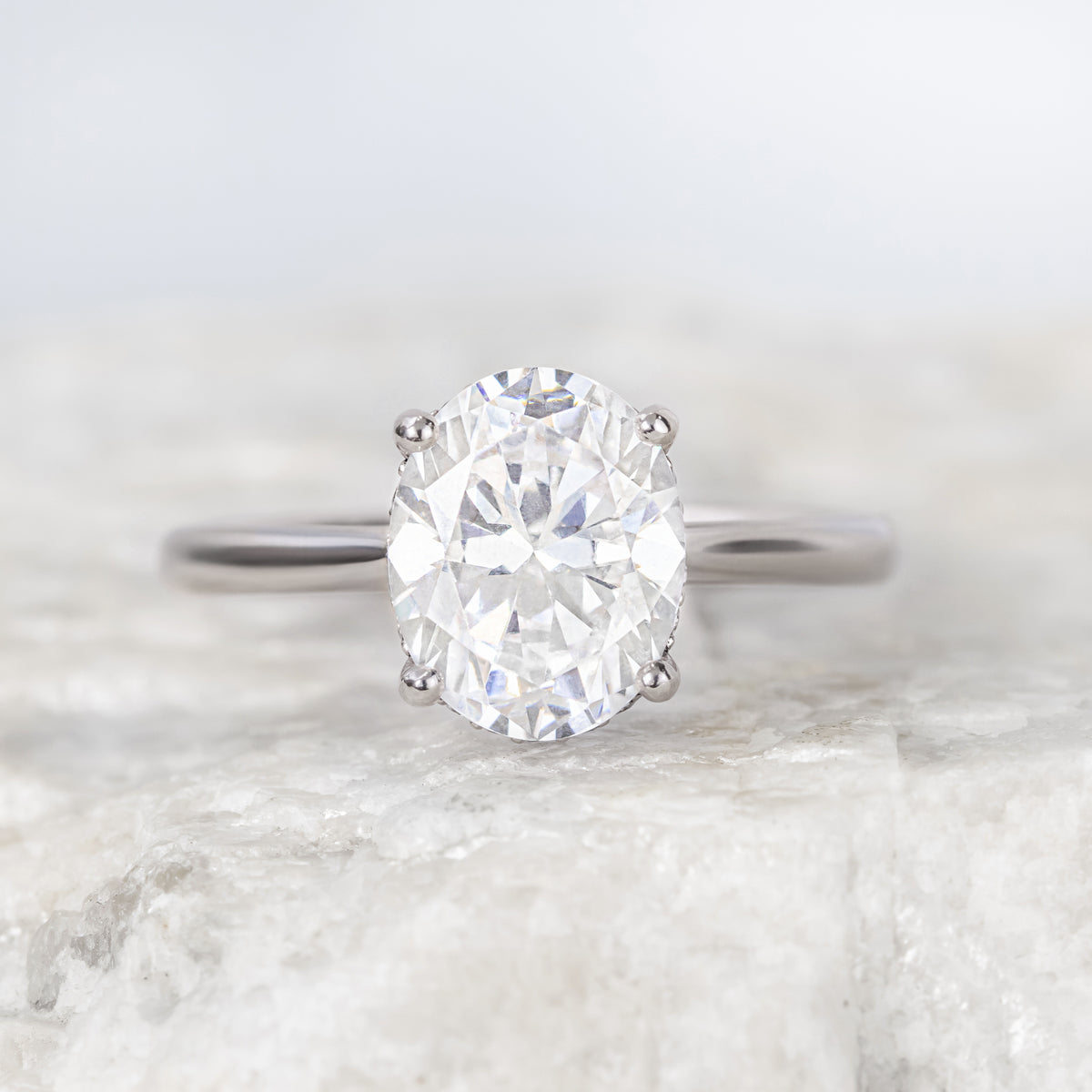 Maeve ~ Oval Hidden Halo Engagement Ring