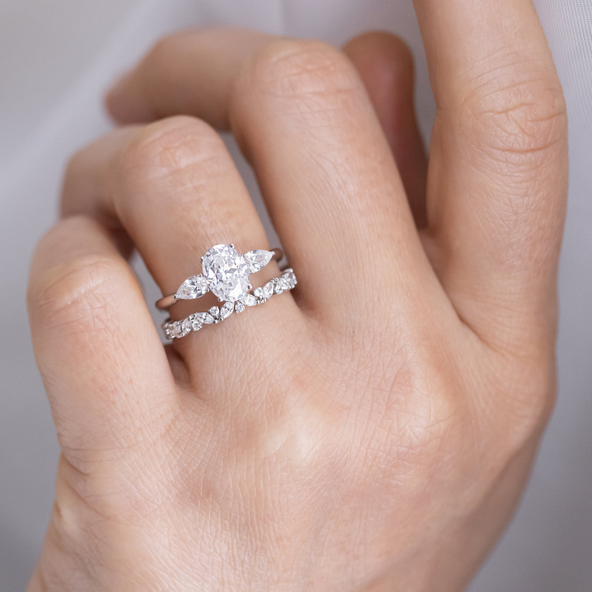 Mae ~ Pear Three Stone Ring