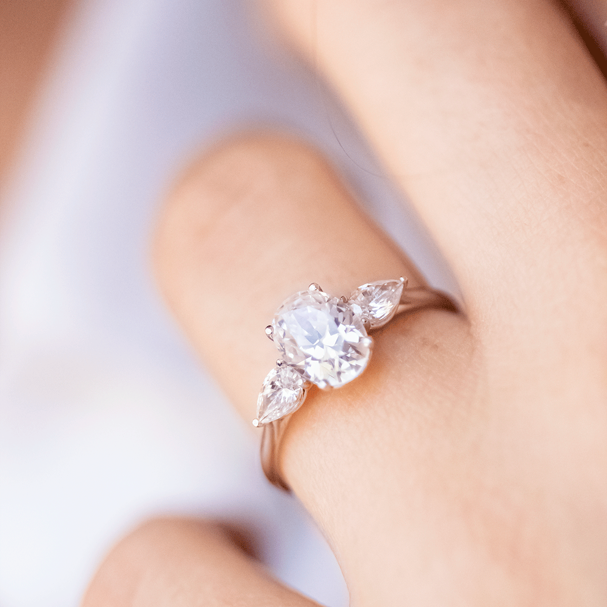Mae ~ Pear Three Stone Ring