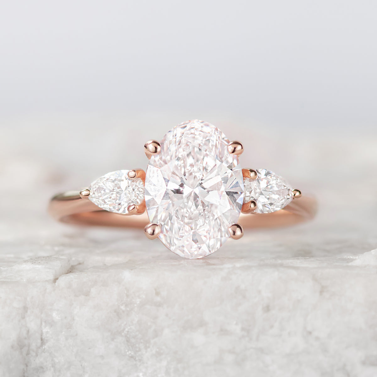 Mae ~ Pear Three Stone Ring