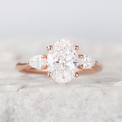 Mae ~ Oval Cut Three Stone Ring