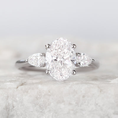 Mae ~ Oval Cut Three Stone Ring