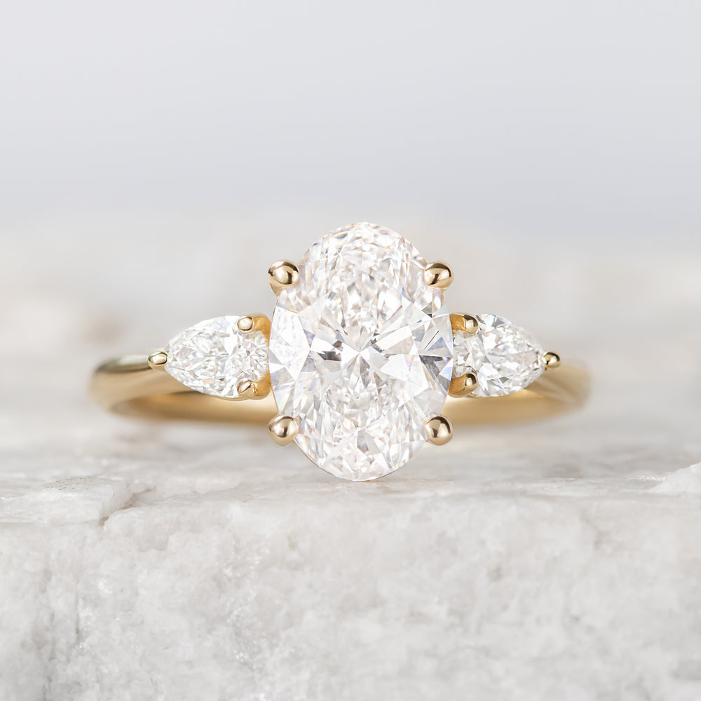 Mae ~ Pear Three Stone Ring