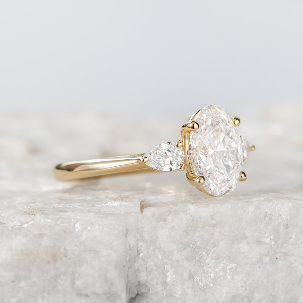 Mae ~ Pear Three Stone Ring