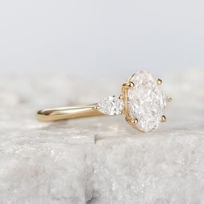 Mae ~ Oval Cut Three Stone Ring