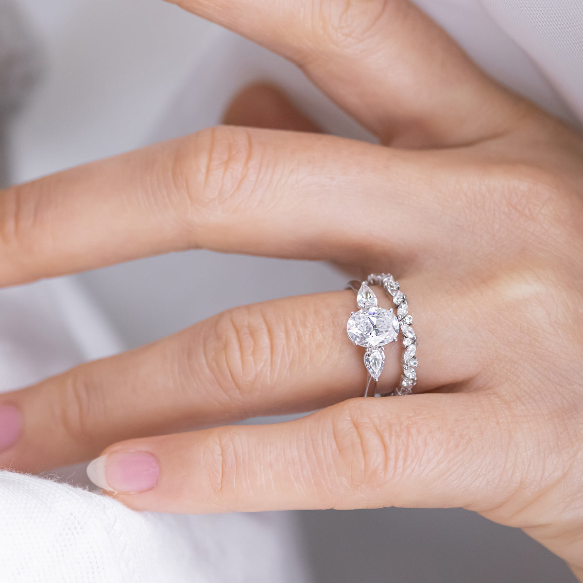 Mae ~ Pear Three Stone Ring