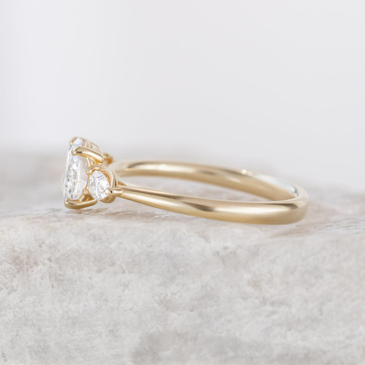 Mae ~ Pear Three Stone Ring