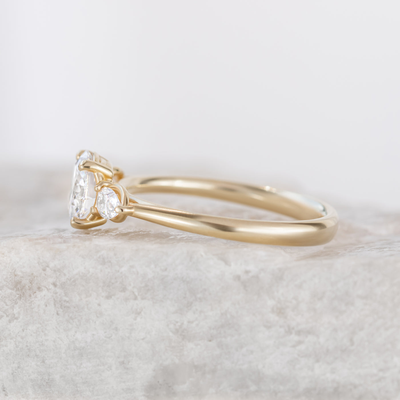 Mae ~ Oval Cut Three Stone Ring