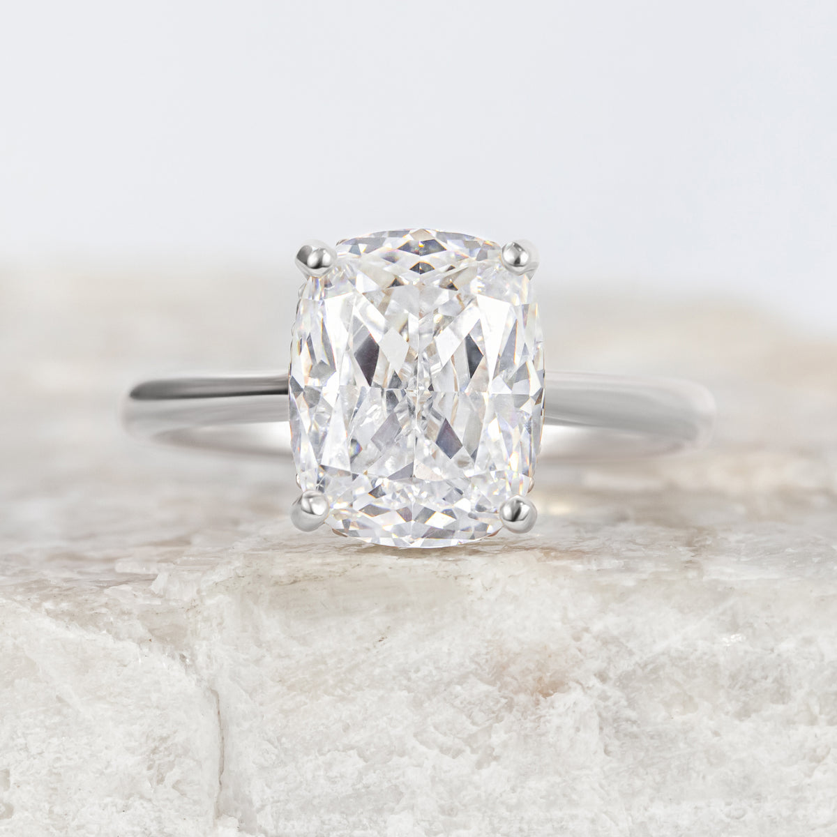 Maeve ~ Elongated Cushion Hidden Halo Engagement Ring
