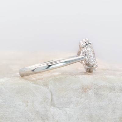 Platinum Oval Diamond Ring with Half-Moon Side Stones