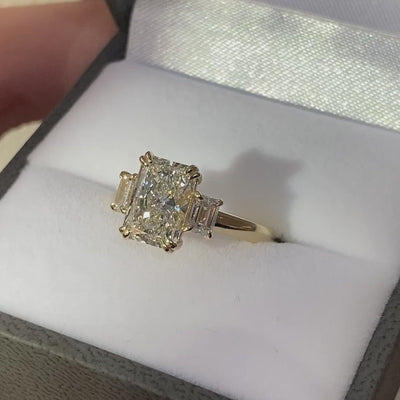 Custom Radiant and Emerald Cut Three-Stone Ring