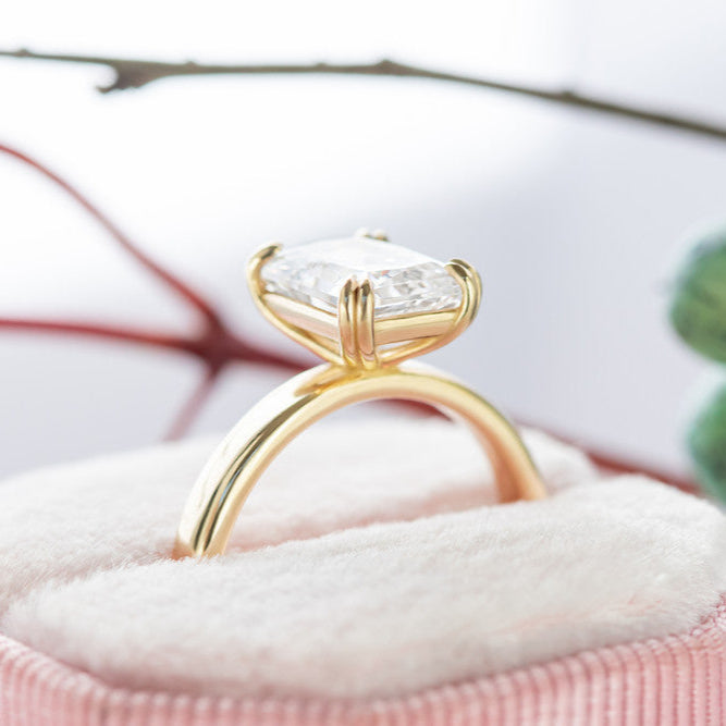 wide band claw prong engagement ring