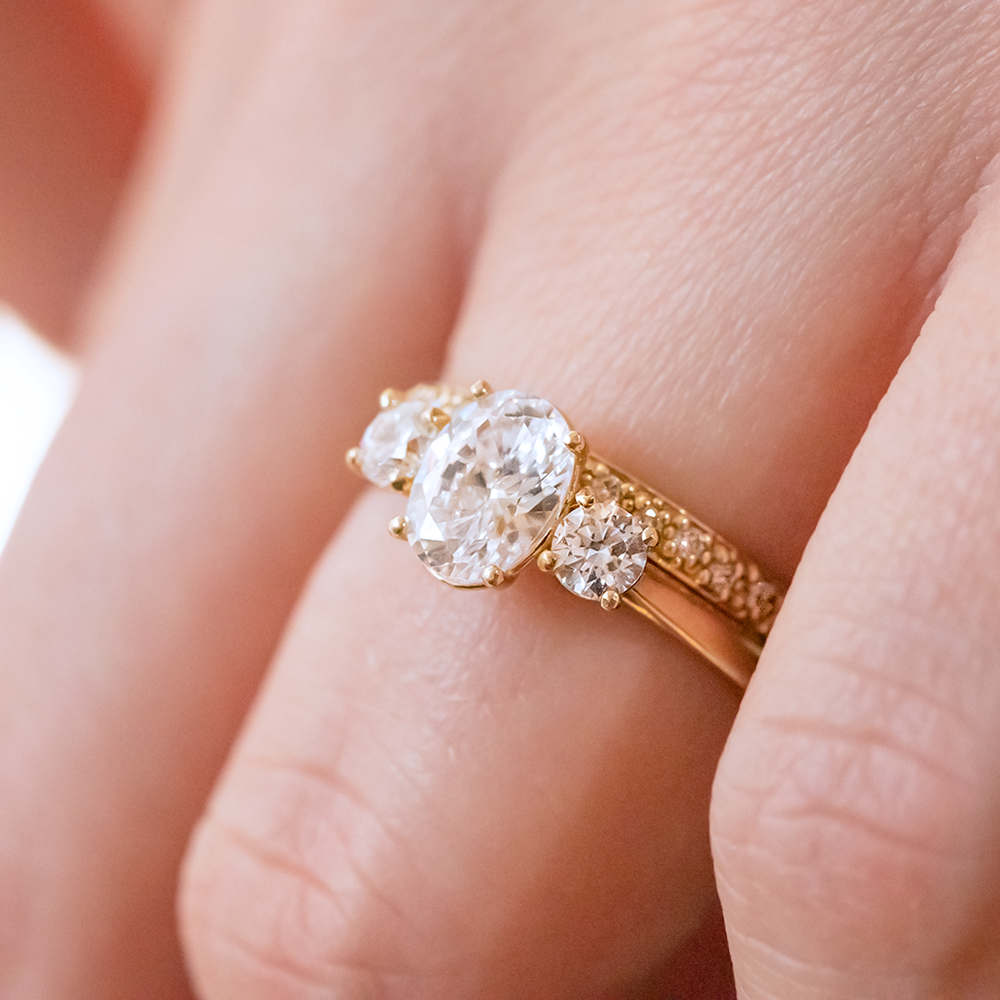 Oval cut 3 stone engagement rings store