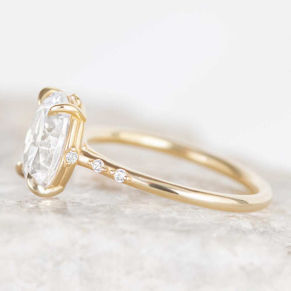 yellow gold oval diamond hidden halo engagement ring